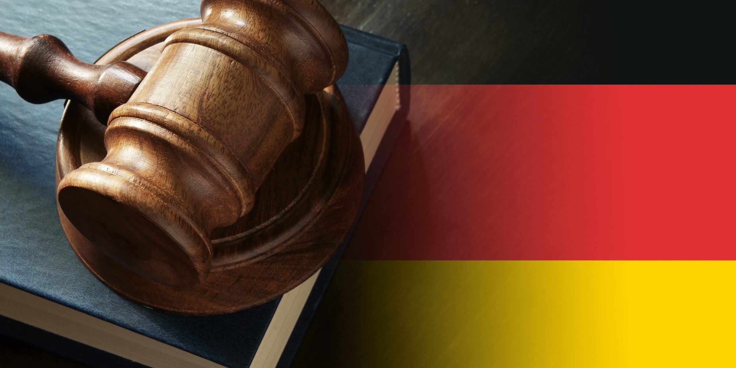 gavel,and,legal,book,on,wooden,table,,collage,with,german